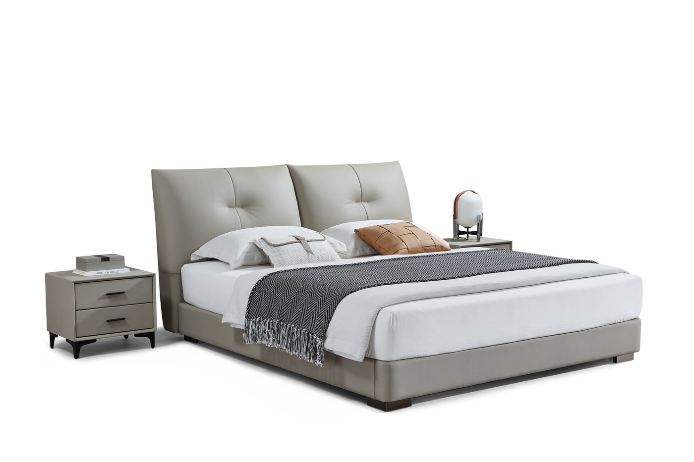 Light upholstered bed with bedside tables